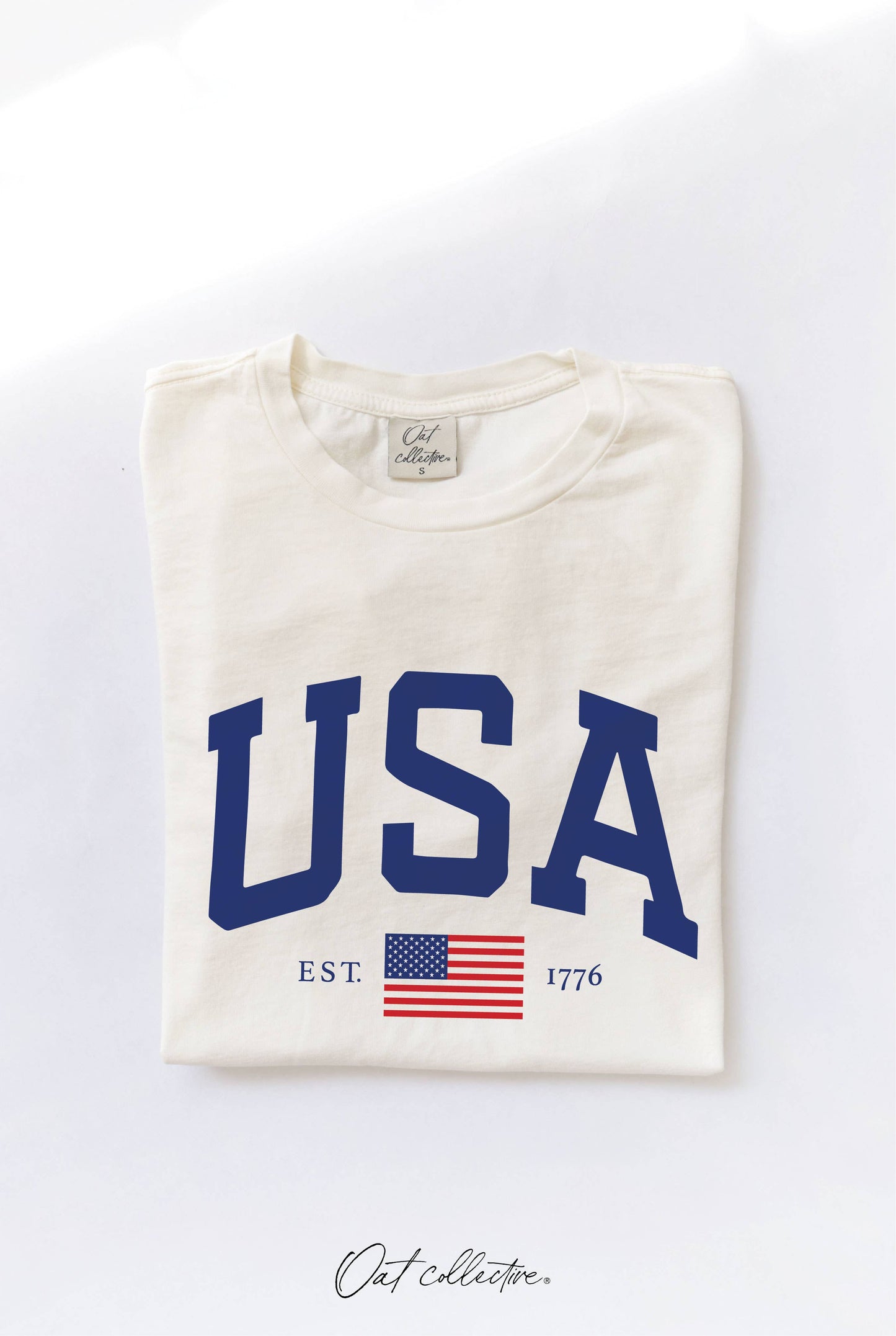  t-shirt with 'USA' and American flag design on a white background
