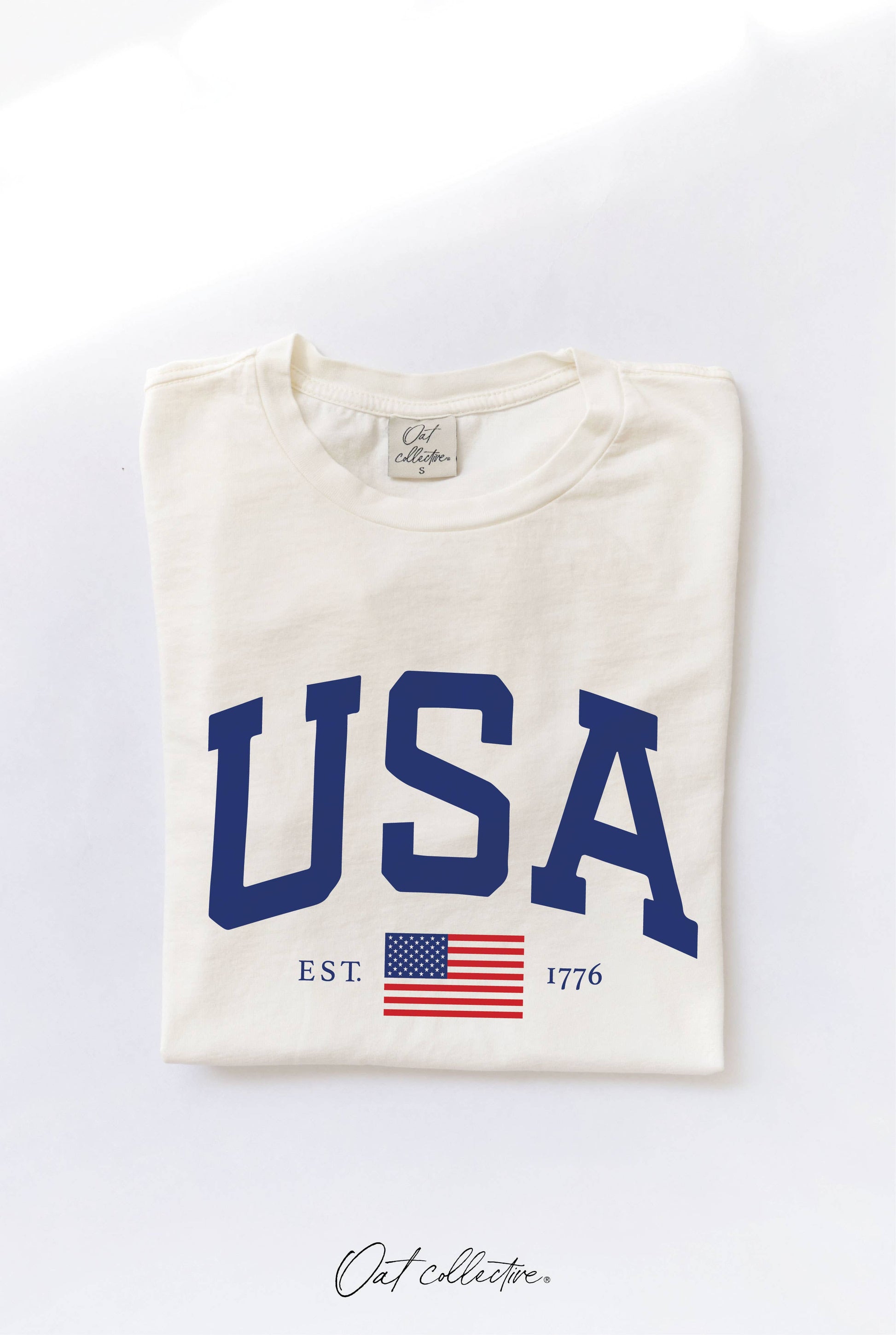  t-shirt with 'USA' and American flag design on a white background