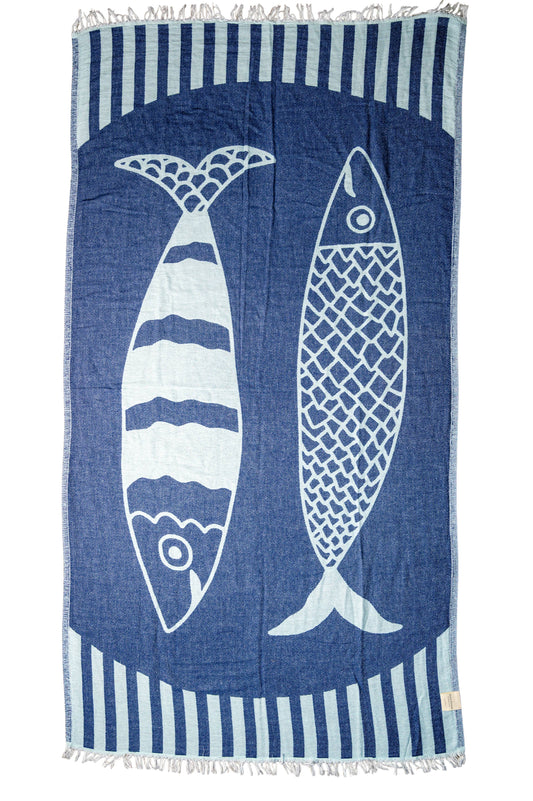 Towel with fish design and striped pattern on a white background